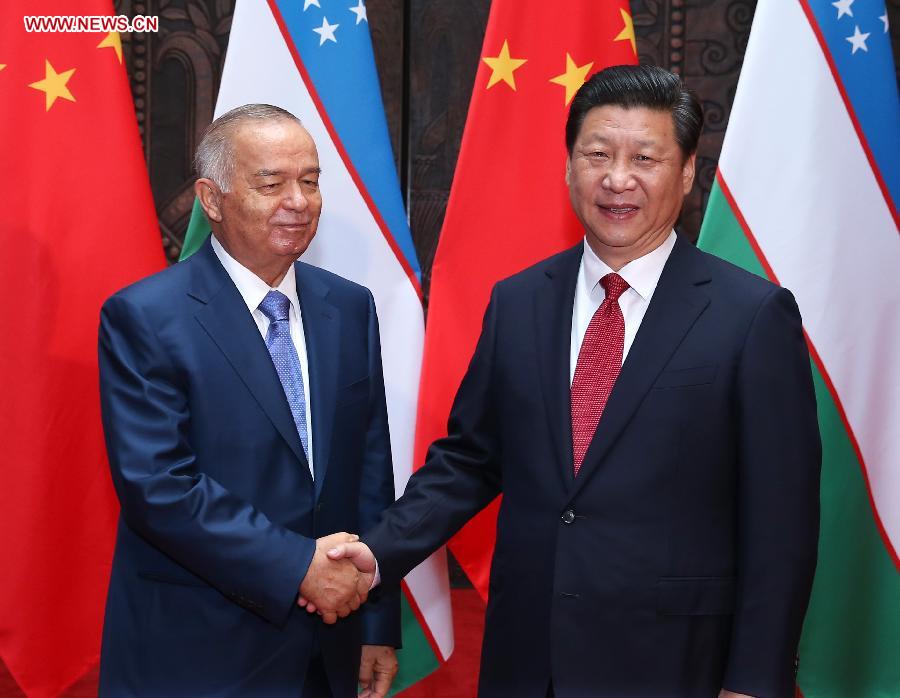 中国与乌兹别克斯坦誓促进两国关系