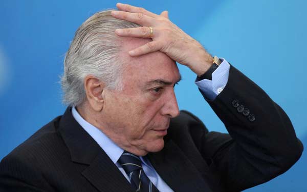 Brazilian President Temer survives parliamentary commission